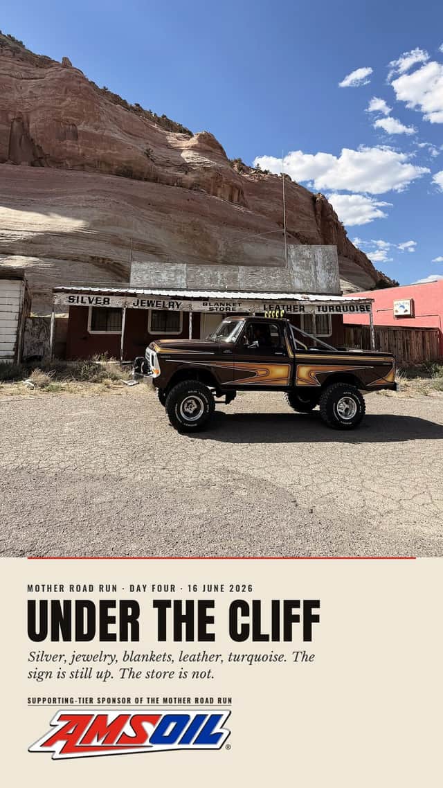 Designed sheet, Under The Cliff: Brownie in profile in front of a closed trading post whose hand-lettered sign still reads silver, jewelry, blankets, leather, turquoise, under a sandstone bluff.