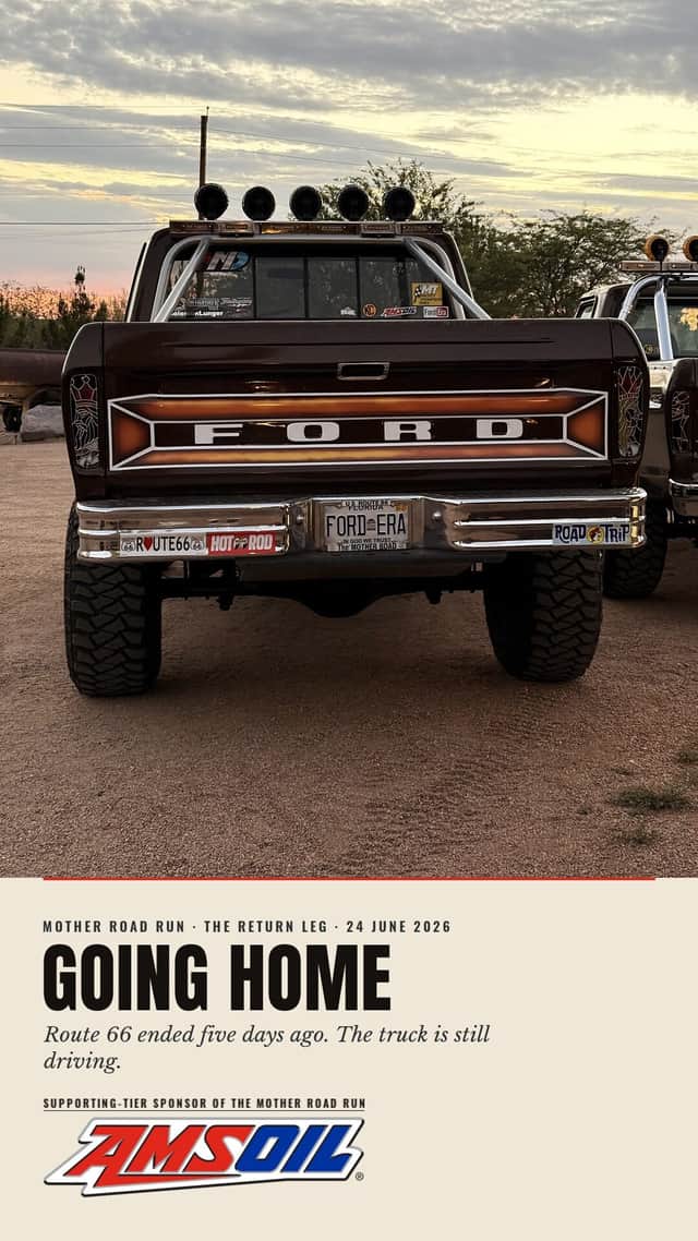 Designed sheet, Going Home: Brownie photographed square-on from behind at dawn, tailgate and rear bumper stickers in frame, on the return leg.