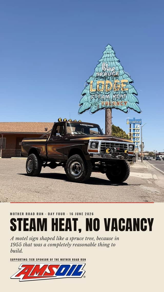 Designed sheet, Steam Heat No Vacancy: Brownie parked below a motel sign built in the shape of a blue spruce tree, day four.